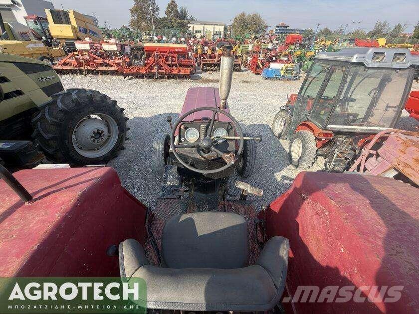 International 724 الجرارات