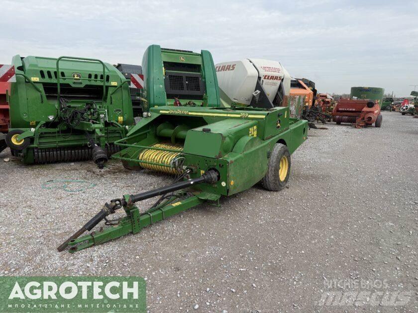 John Deere 359 الجرارات