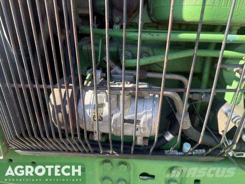 John Deere 4450 الجرارات