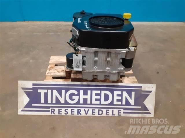 John Deere STX38 ركوب الحشائش