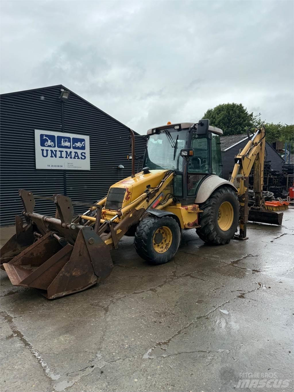 New Holland NH95 لوادر ذات جرافات عكسية