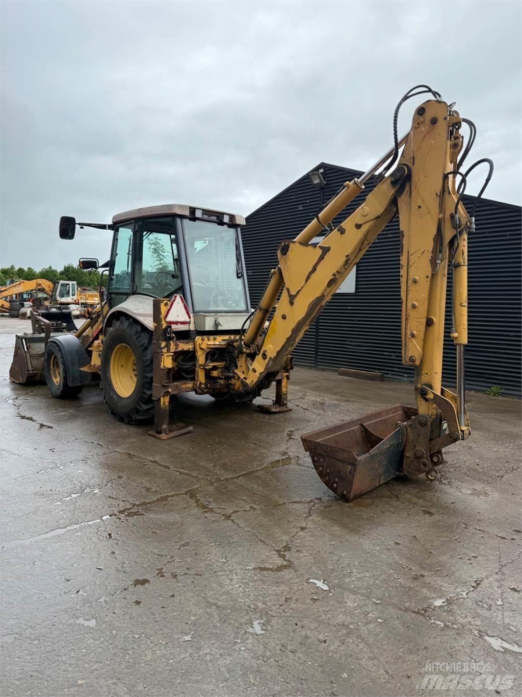 New Holland NH95 لوادر ذات جرافات عكسية