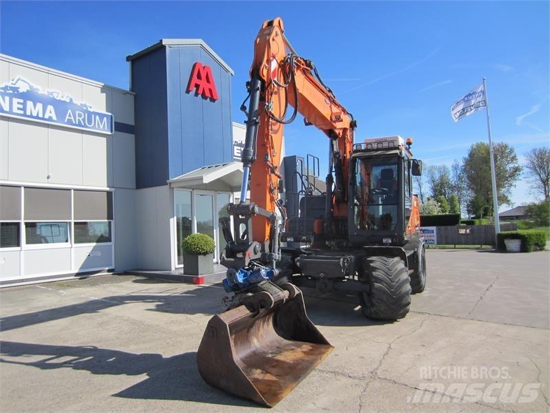 Doosan DX140W-3 حفارات بعجل