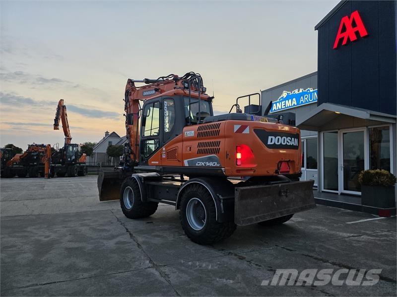 Doosan DX140W-5 حفارات بعجل