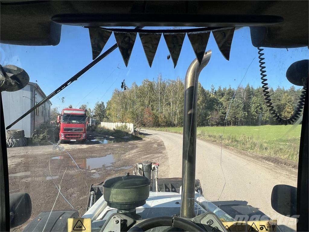 Terex  لوادر ذات جرافات عكسية