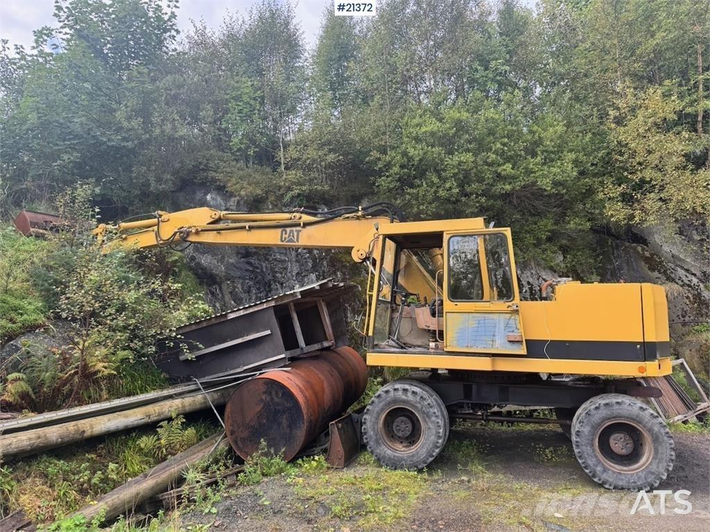 CAT 212B حفارات بعجل