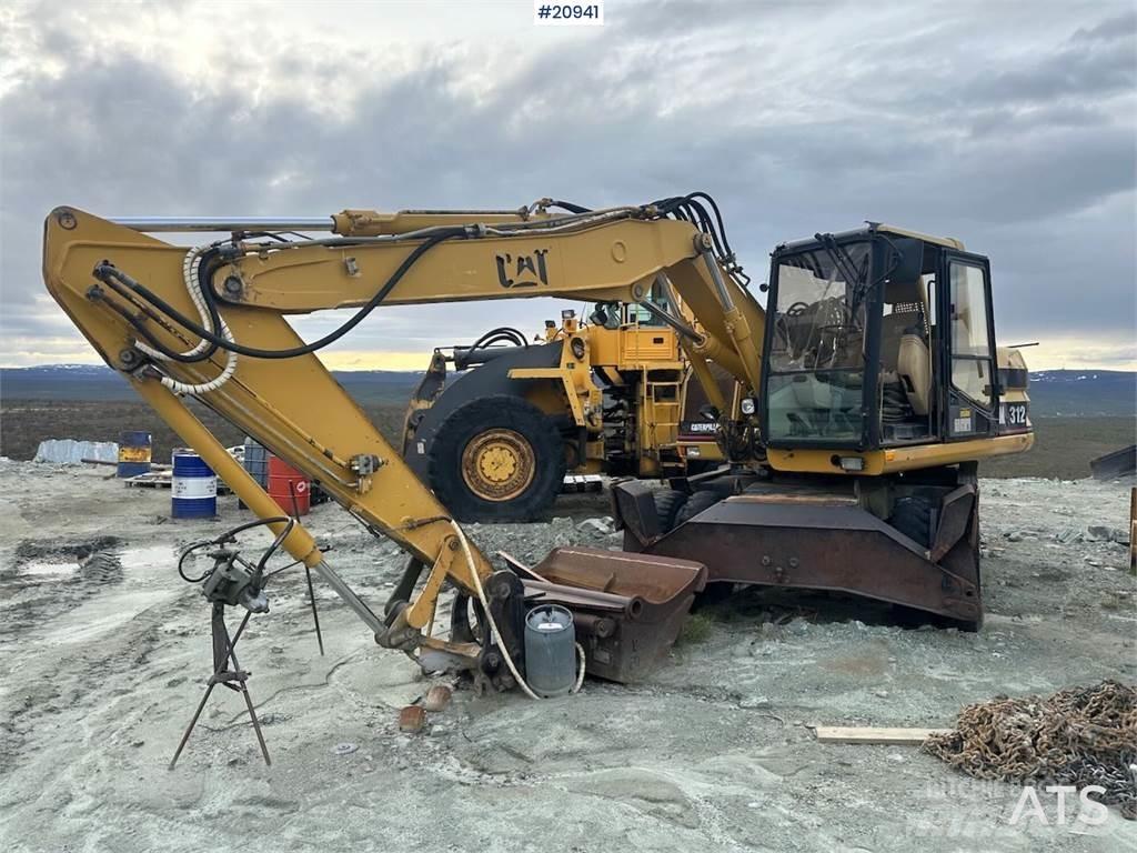 CAT 312 حفارات بعجل