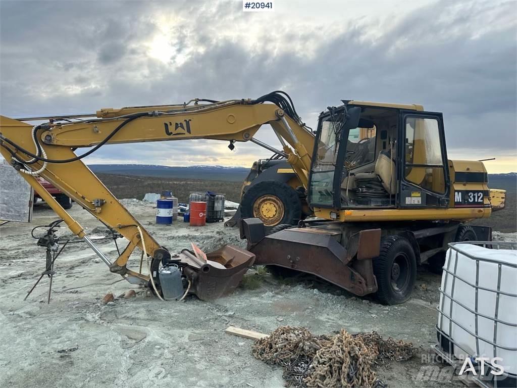 CAT 312 حفارات بعجل