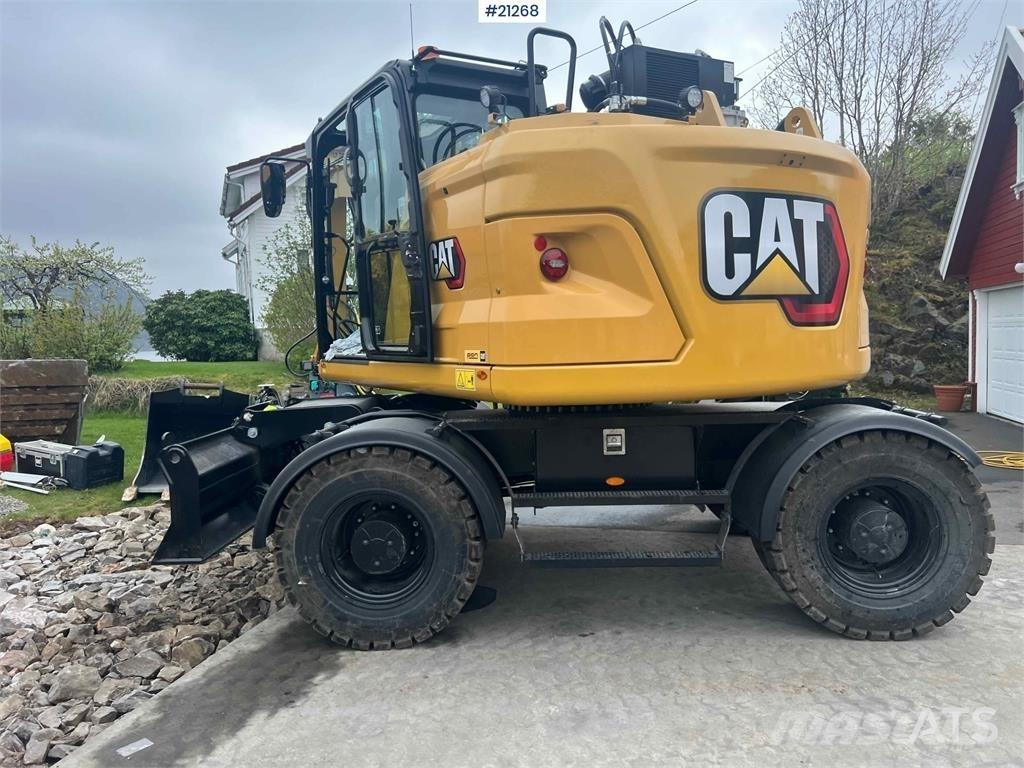 CAT M315 حفارات بعجل