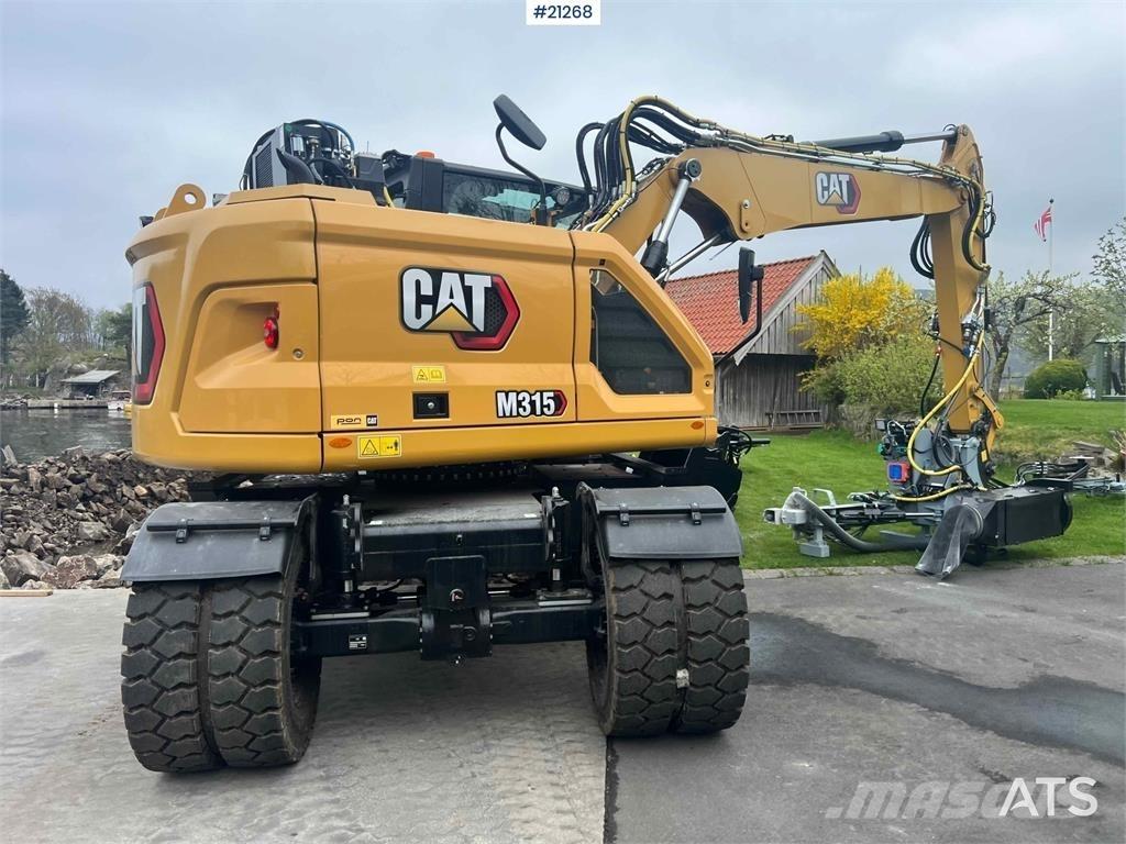 CAT M315 حفارات بعجل