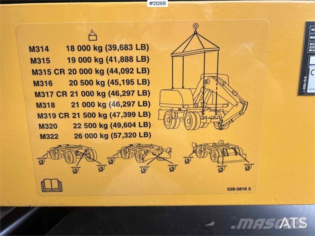 CAT M315 حفارات بعجل