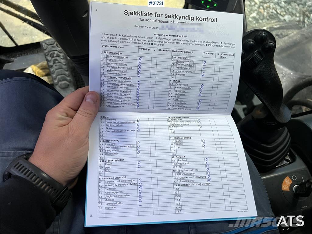 CAT M318F حفارات بعجل