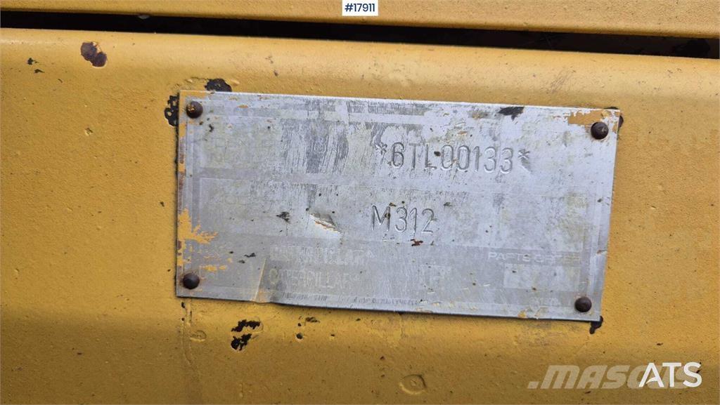 CAT M312 حفارات بعجل