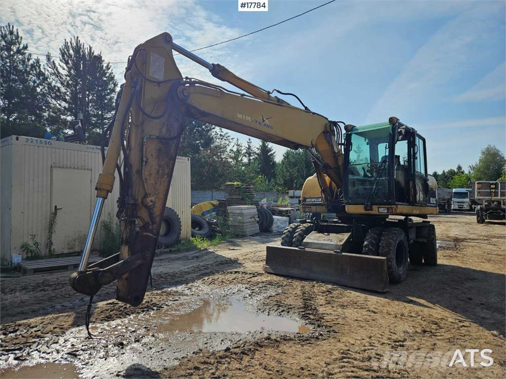 CAT M316C حفارات بعجل