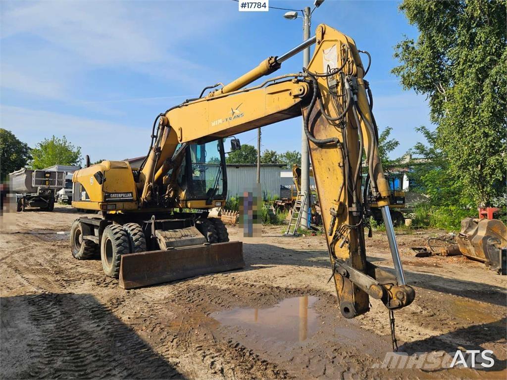 CAT M316C حفارات بعجل