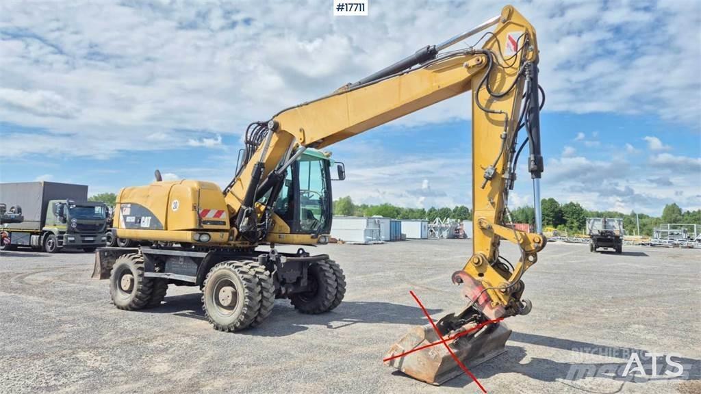 CAT M316D حفارات بعجل