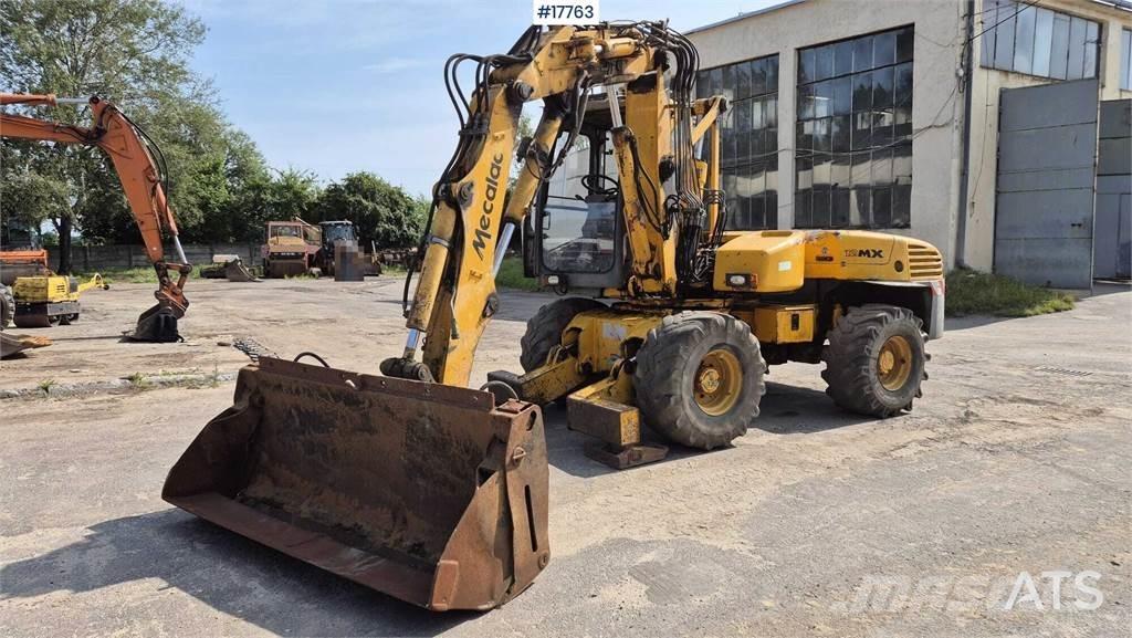 Mecalac 12MX حفارات بعجل
