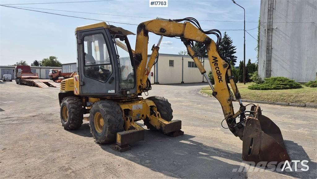 Mecalac 12MX حفارات بعجل
