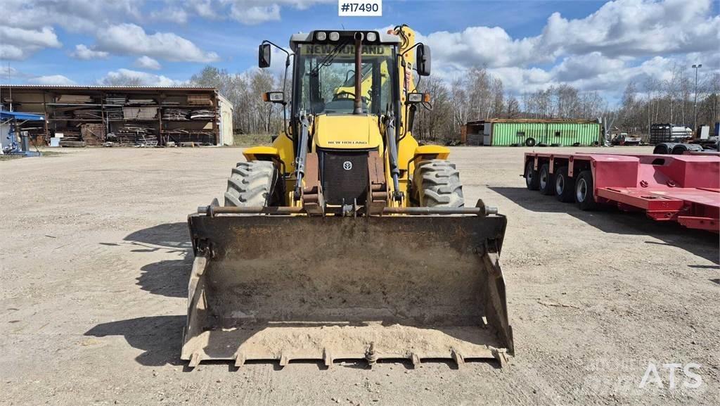 New Holland B 115C لوادر ذات جرافات عكسية