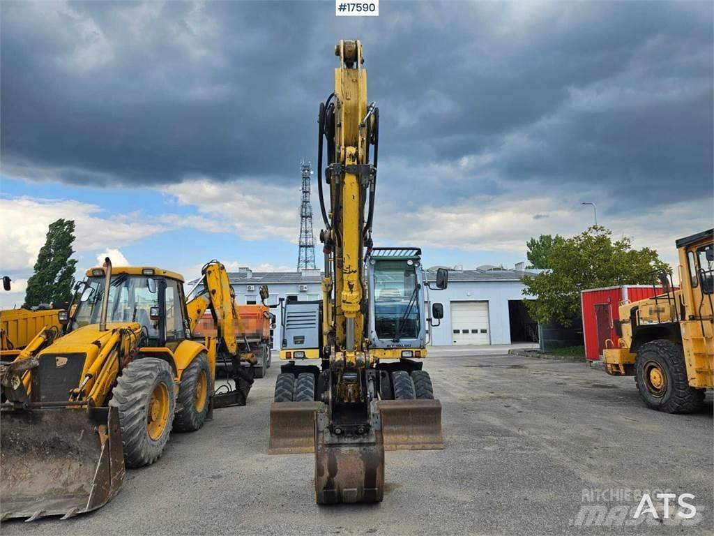 New Holland WL 170C حفارات بعجل