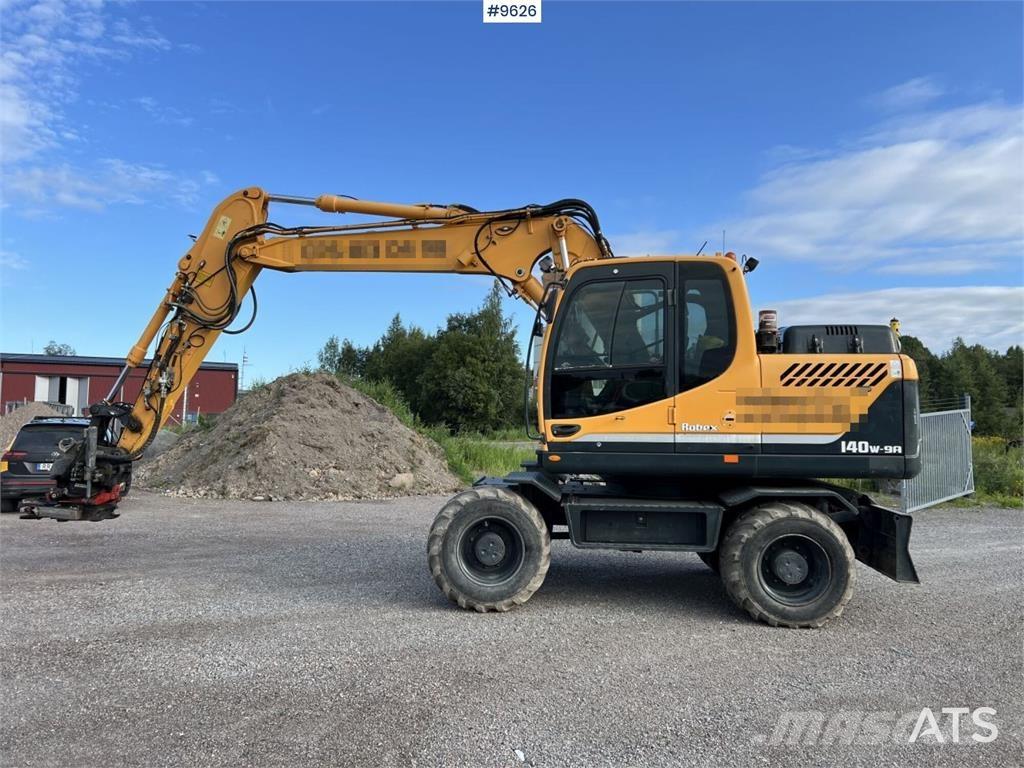 Hyundai 140W-9A حفارات بعجل
