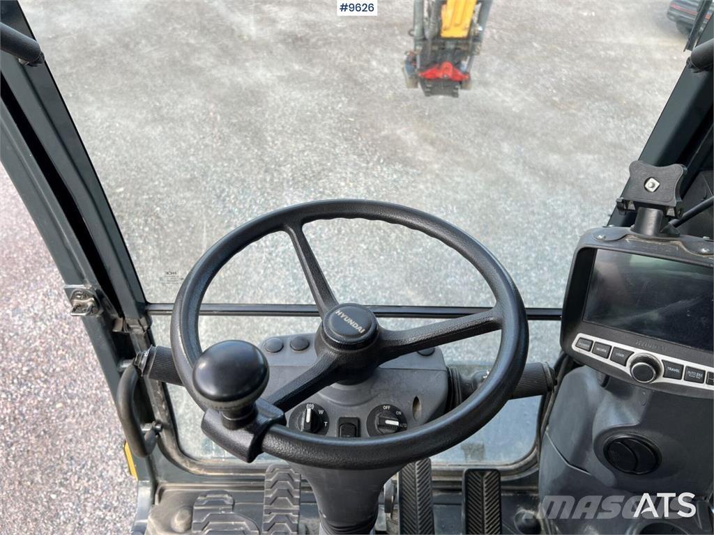Hyundai 140W-9A حفارات بعجل