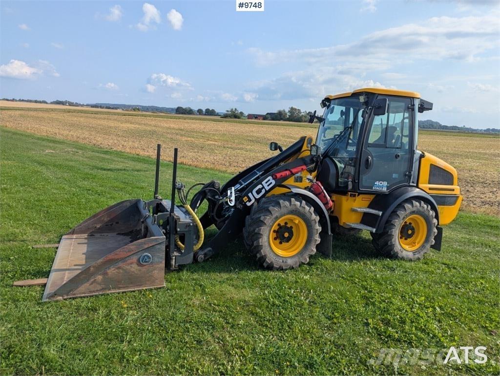 JCB 409 لوادر بعجل