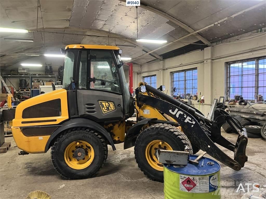 JCB 409 T4 بلدوزرات بعجلات