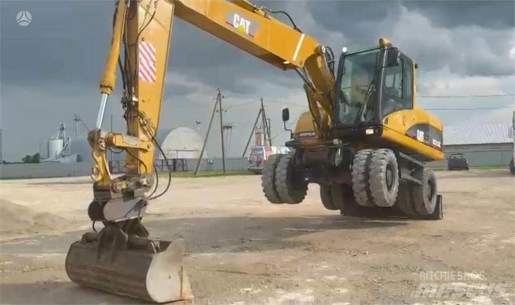 CAT M315C حفارات بعجل