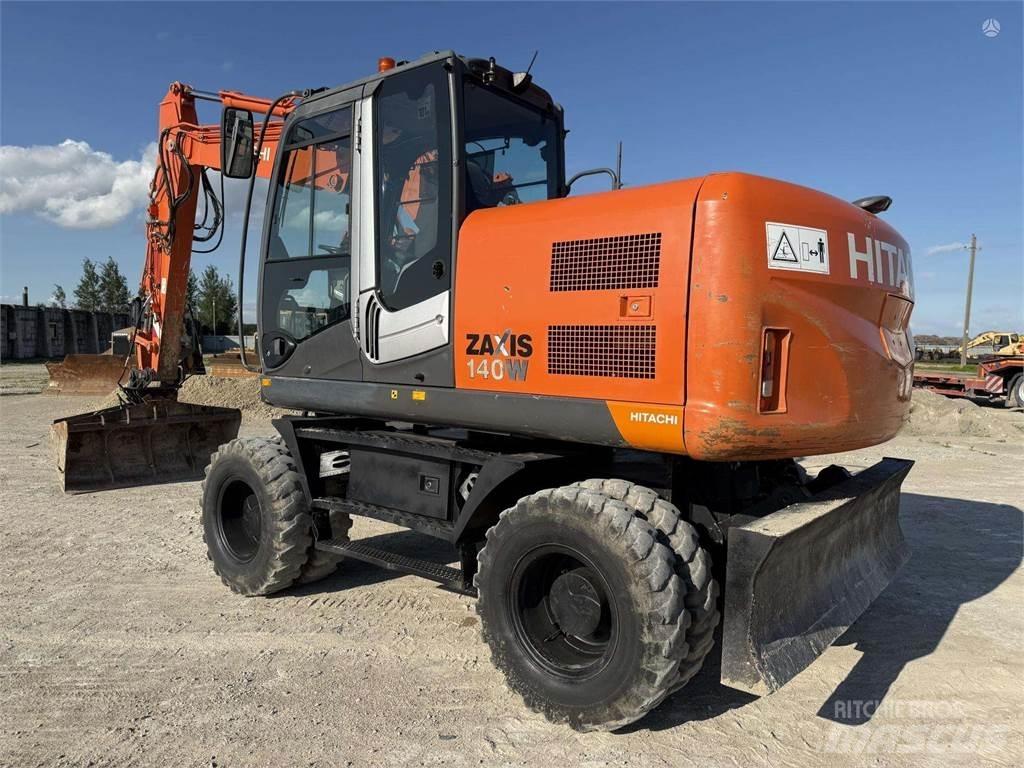 Hitachi ZX 140 W حفارات بعجل