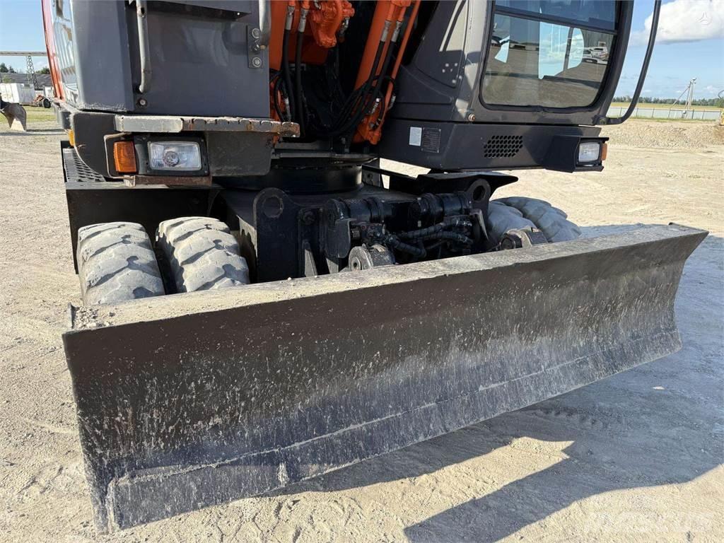 Hitachi ZX 140 W حفارات بعجل