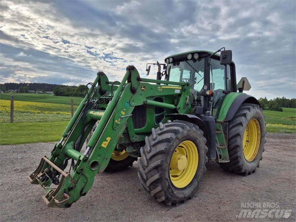 John Deere 7530 الجرارات