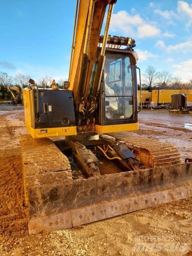 CAT 310 حفارات زحافة