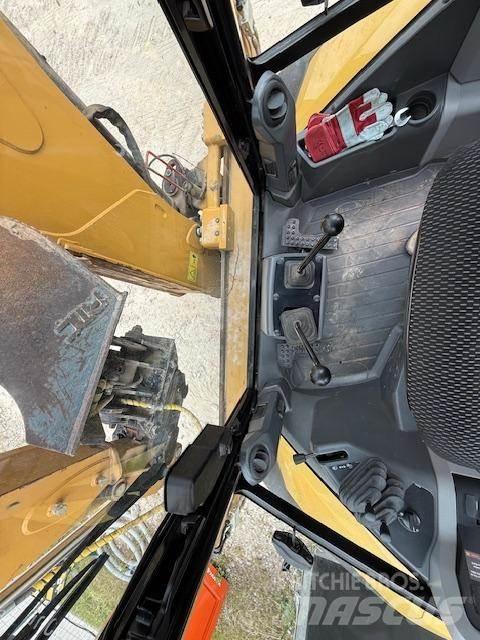 CAT 434-07 لوادر ذات جرافات عكسية