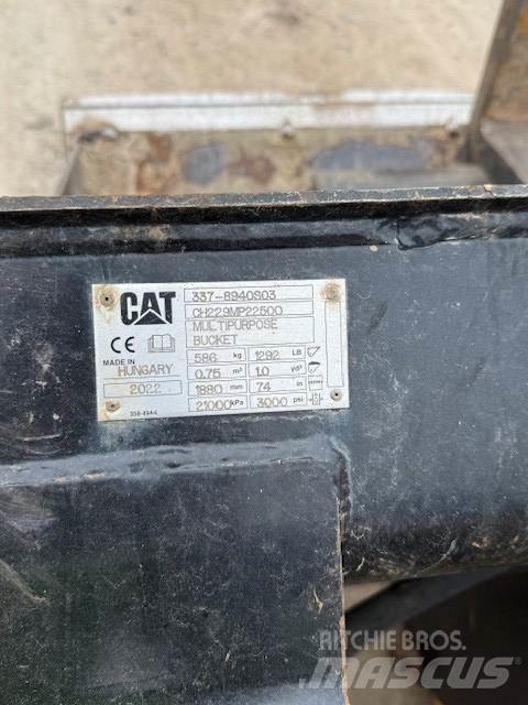 CAT 906 لوادر بعجل