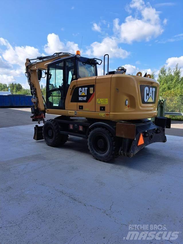 CAT M314F حفارات بعجل
