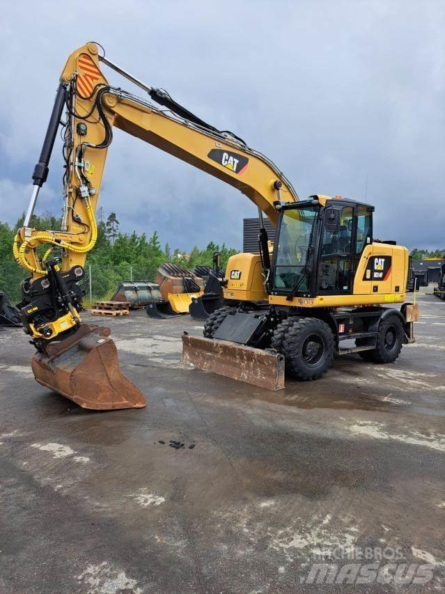 CAT M314F حفارات بعجل
