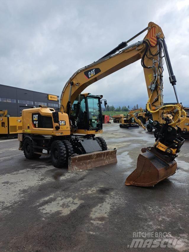 CAT M314F حفارات بعجل