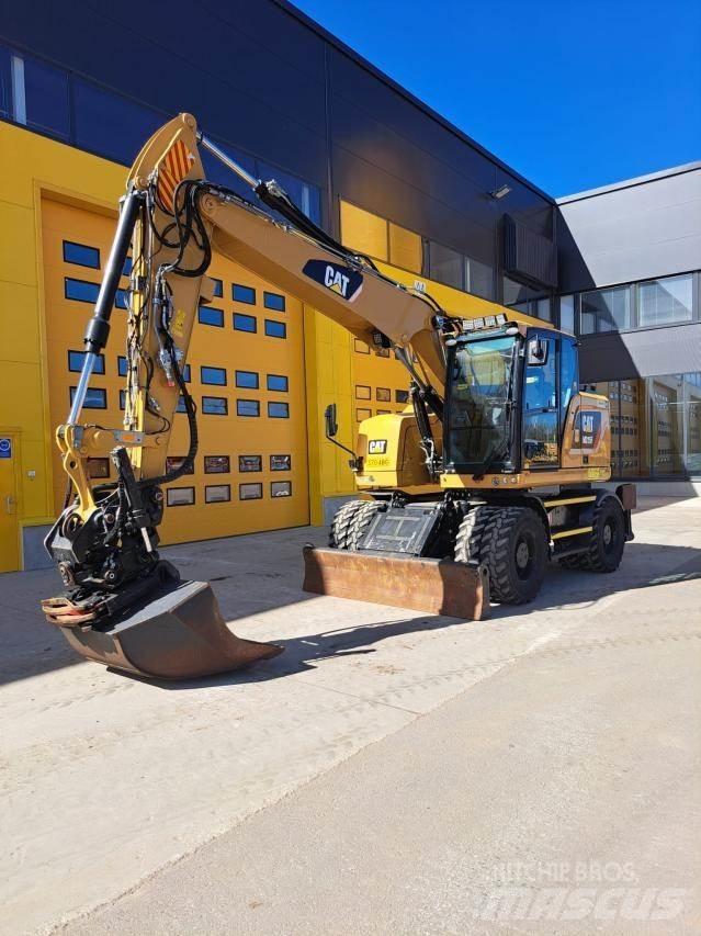 CAT M315F حفارات بعجل