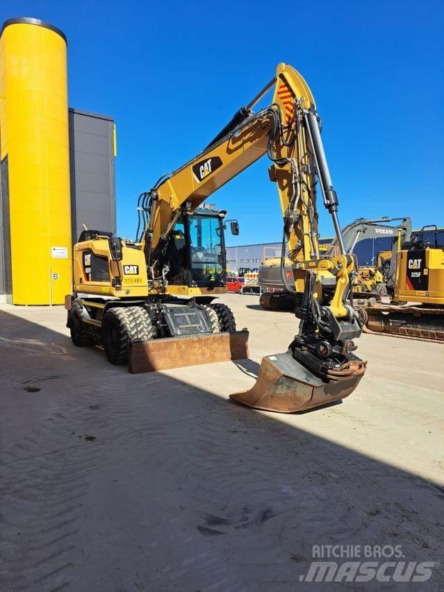 CAT M315F حفارات بعجل