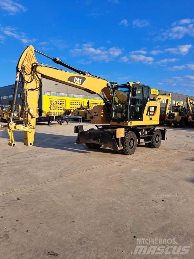 CAT M315F حفارات بعجل
