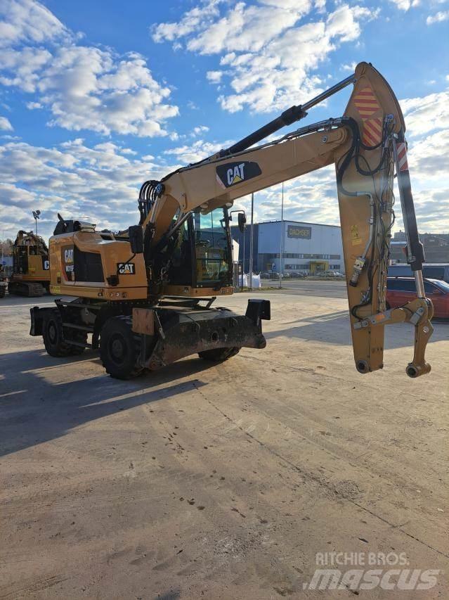 CAT M315F حفارات بعجل