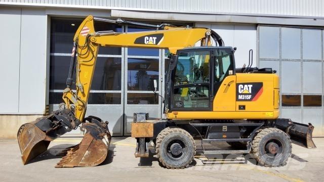 CAT M315F حفارات بعجل