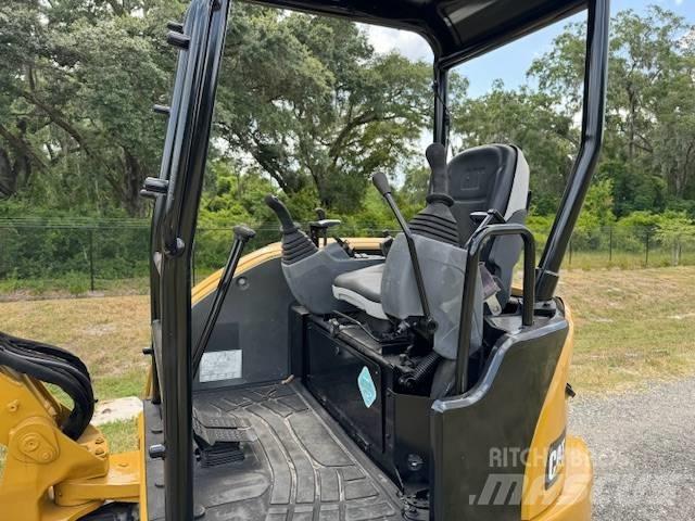 CAT 303 E CR حفارات زحافة