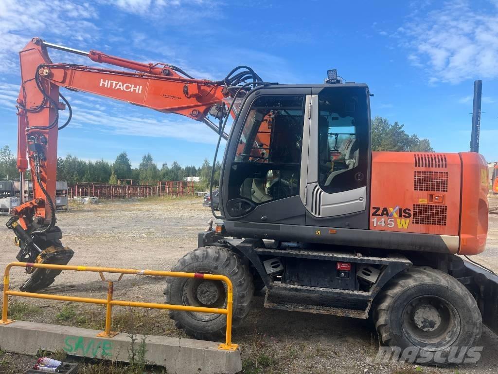 Hitachi ZX 145 W-3 حفارات بعجل