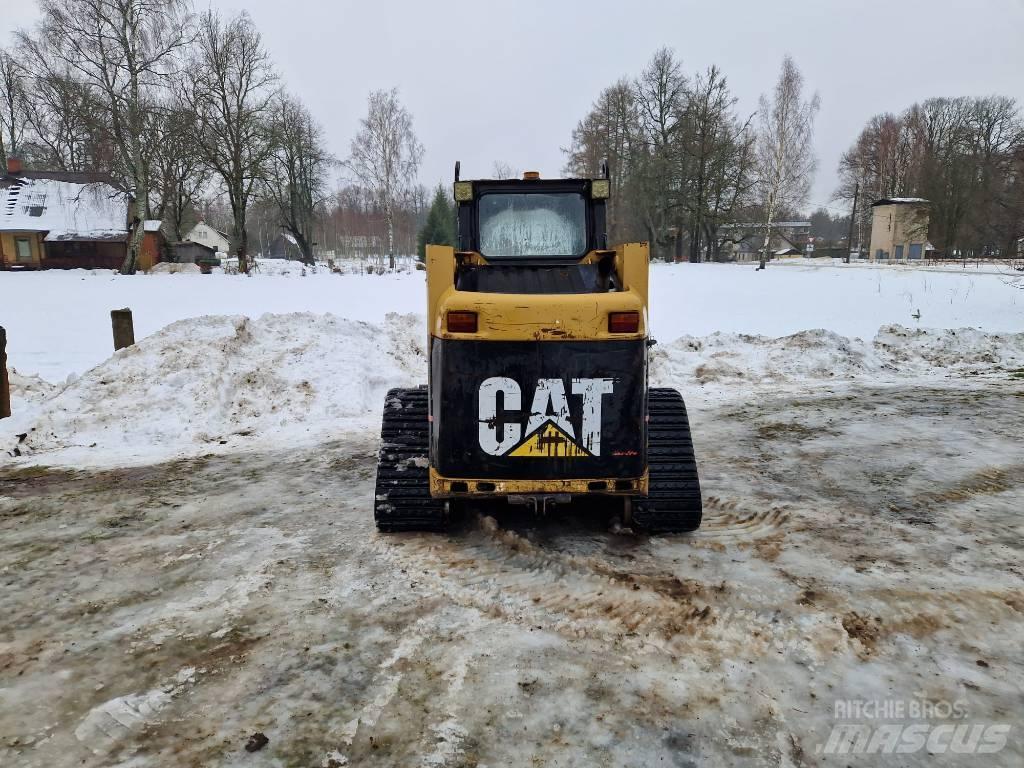 CAT 247 B لوادر زحافة