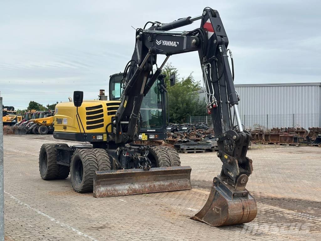 Yanmar B 110 W حفارات بعجل