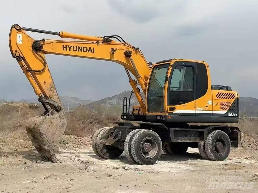 Hyundai 15 BT-9 حفارات بعجل