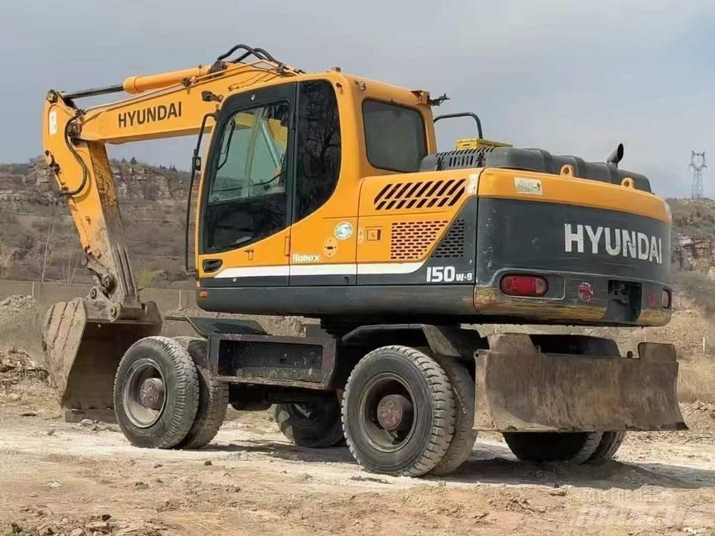 Hyundai 15 BT-9 حفارات بعجل