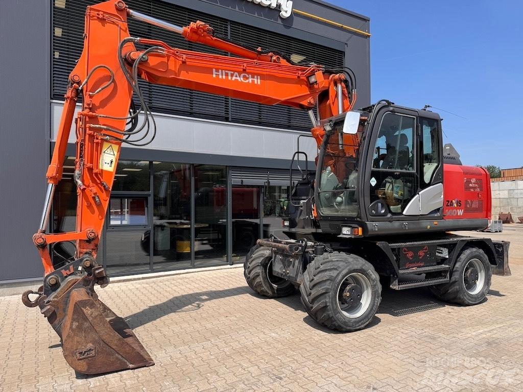 Hitachi 140W حفارات بعجل